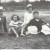 A family relax on the tennis court, 1923
